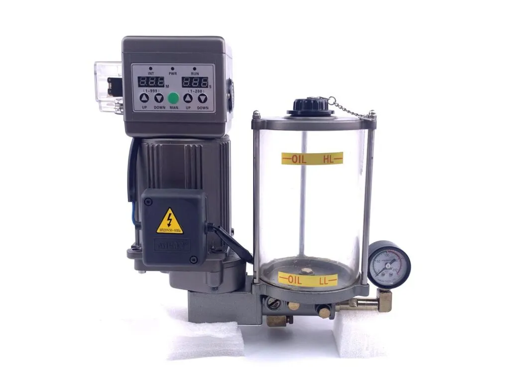 Bơm mỡ tự động SKF LAGD: Bơm mỡ tự động có bảng điều khiển số, bình trong và đồng hồ áp