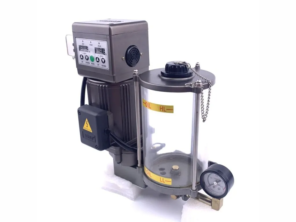 Bơm mỡ tự động SKF LAGD: Bơm mỡ tự động góc nghiêng, bình trong có xích nắp và đồng hồ áp suất