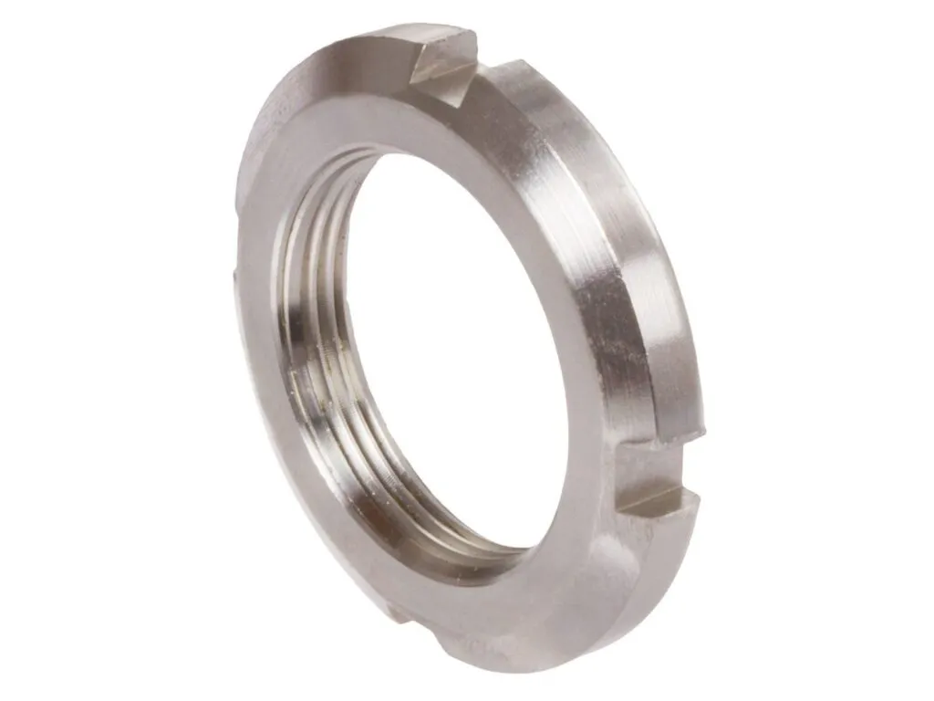 Đai ốc khóa KM và vòng đệm MB: Đai ốc khóa inox sáng bóng có ba rãnh khía trên vành